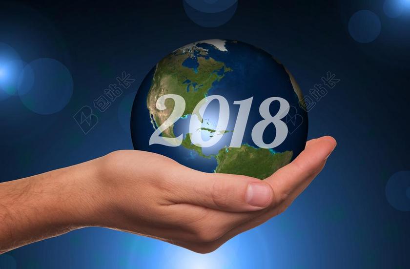 手中蓝色的地球背景图片