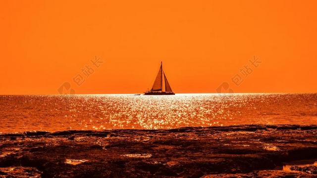 日落 阳光 船 双体船 岩质海岸 橙色 海 景观 晚上