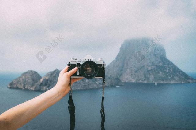 相机 镜头 SELFIE 单反 手 手臂 岛 山 天空 云