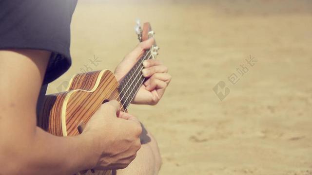 音乐唯美弹奏吉他的人背景图片