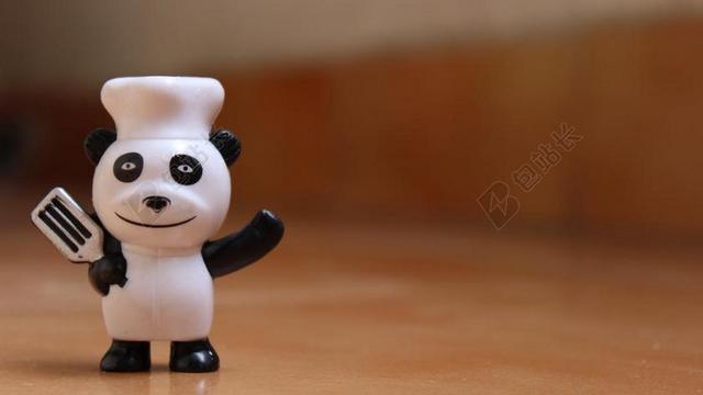 广告时尚厨师熊猫公仔背景图片