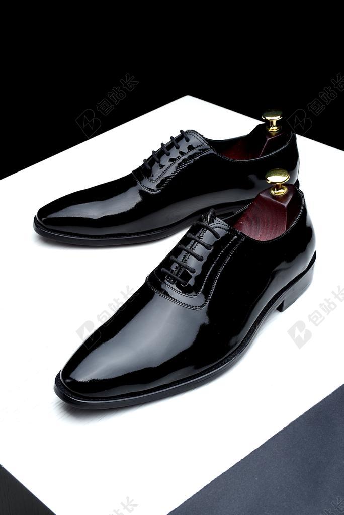 广告时尚牛皮皮鞋背景图片