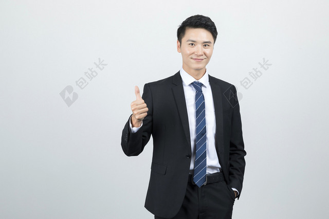 成功的商务人士竖拇指图片